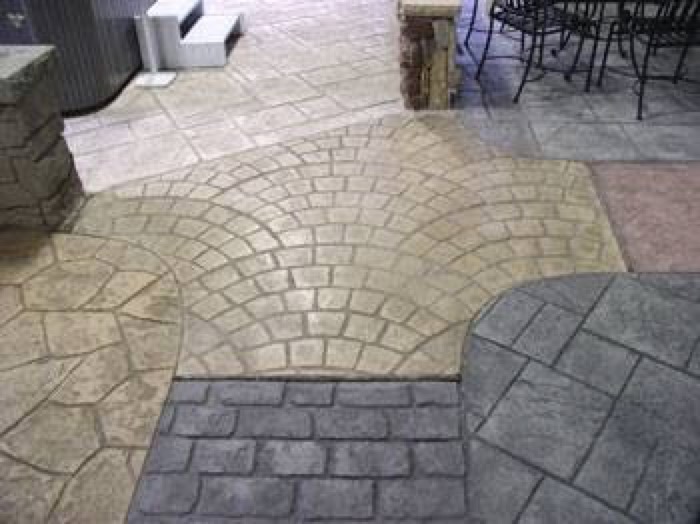 Stamped concrete patterns — cobblestone fan, flagstone and brick borders